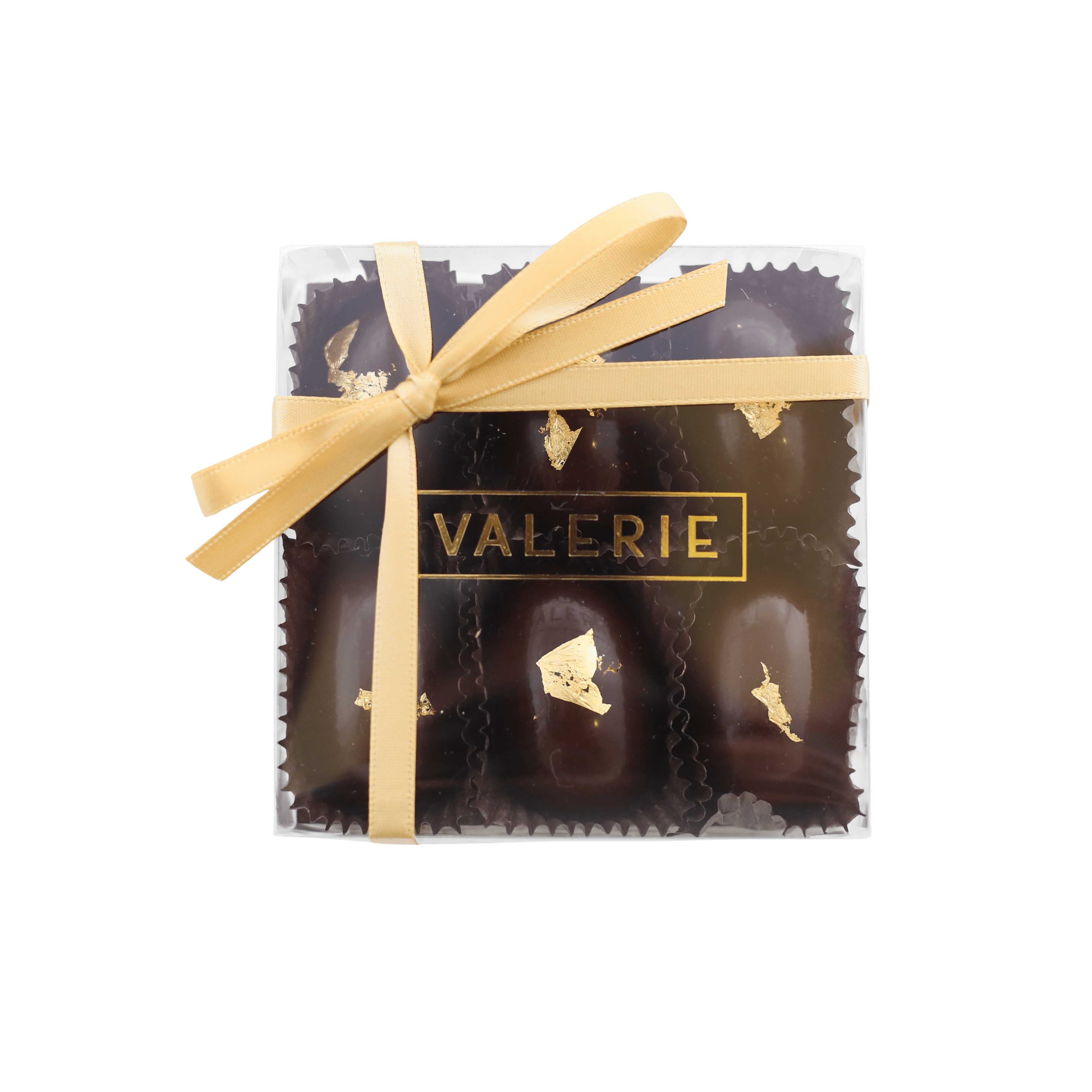 Packaged chocolate eggs with a gold bow and 'Valerie' branding on a white background