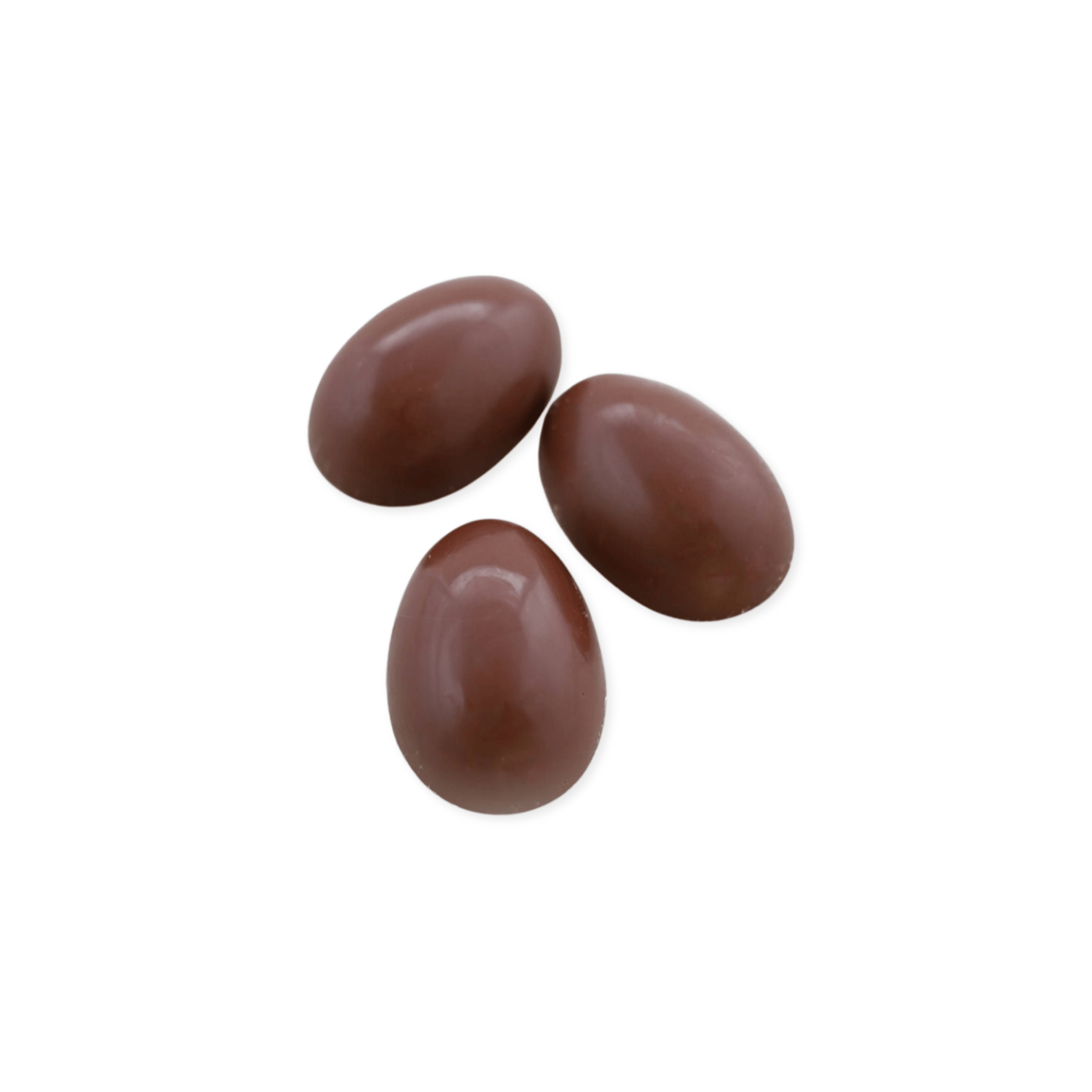 Three chocolate eggs on a white background