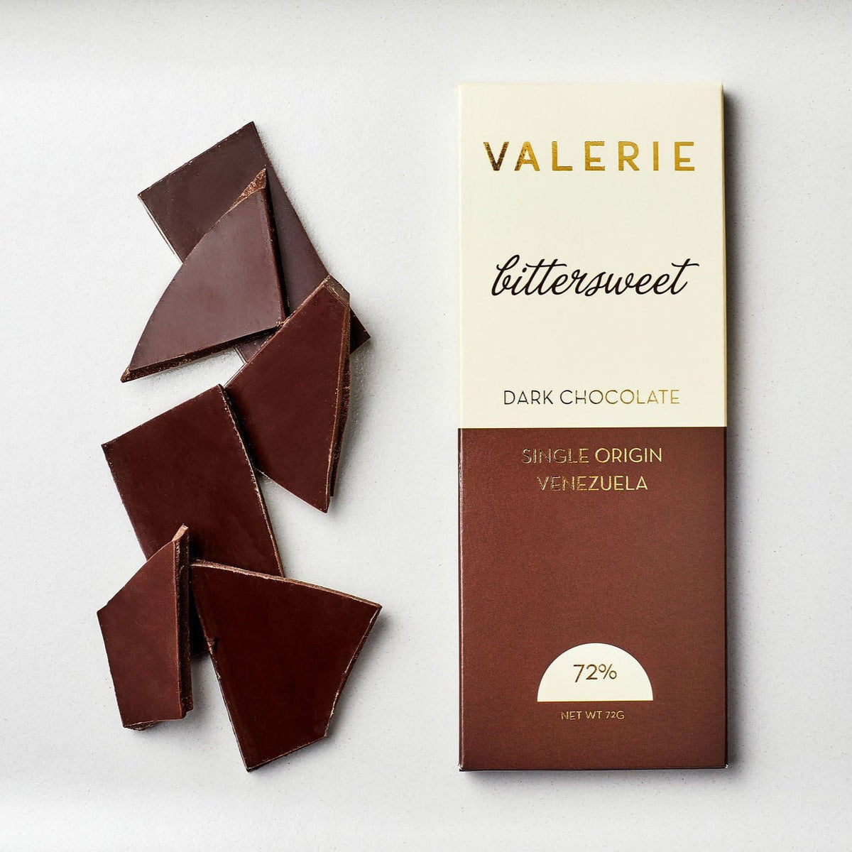A Bittersweet Chocolate Bar made with 72% single-origin Venezuelan dark chocolate, displayed alongside broken chocolate pieces.