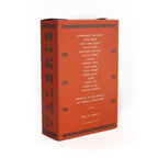 An orange Good Mix box featuring an ingredient list with premium chocolate, nuts, and seeds.