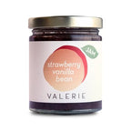 A 7-ounce jar of Strawberry Vanilla Bean Jam by Valerie Confections, featuring a minimalist label with a soft peach and red design. Handmade with fresh strawberries and real vanilla bean for a rich, aromatic flavor.