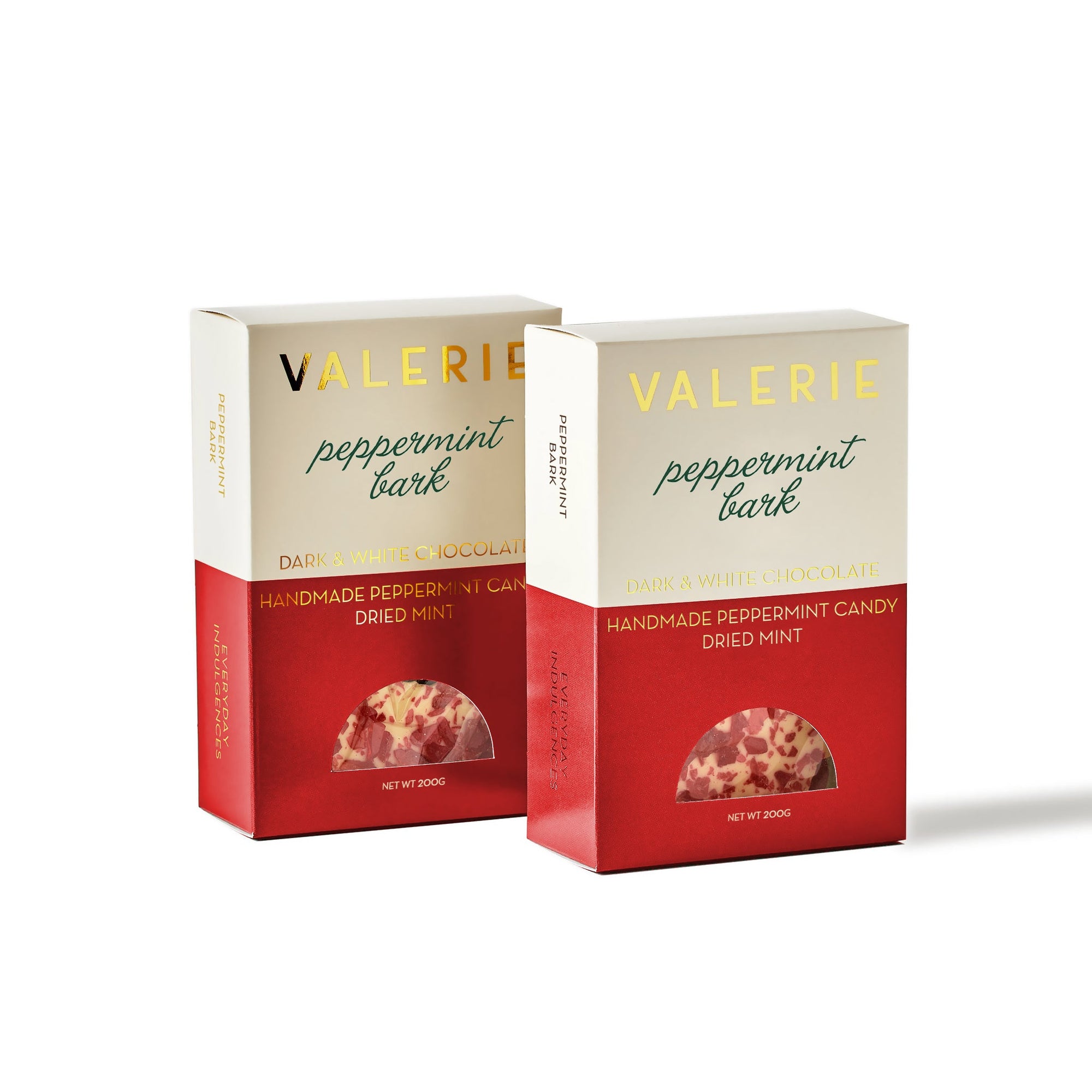 Two boxes of "Valerie Peppermint Bark" with a cream top half and a red bottom half.