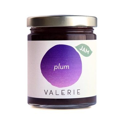 Jar of Valerie plum jam with a gold lid and labeled with a purple plum illustration.